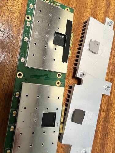 Thermal pads under front radiator on WLAN cards. Approx 12x12mm 1mm thick